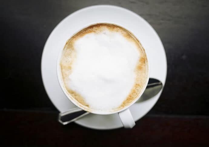 a cup of frothy cappuccino